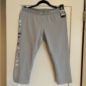 Ladies gray Under Armour ankle exercise pants.  Brand new with tags.